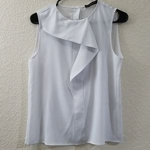 ZARA's white sleeveless blouse